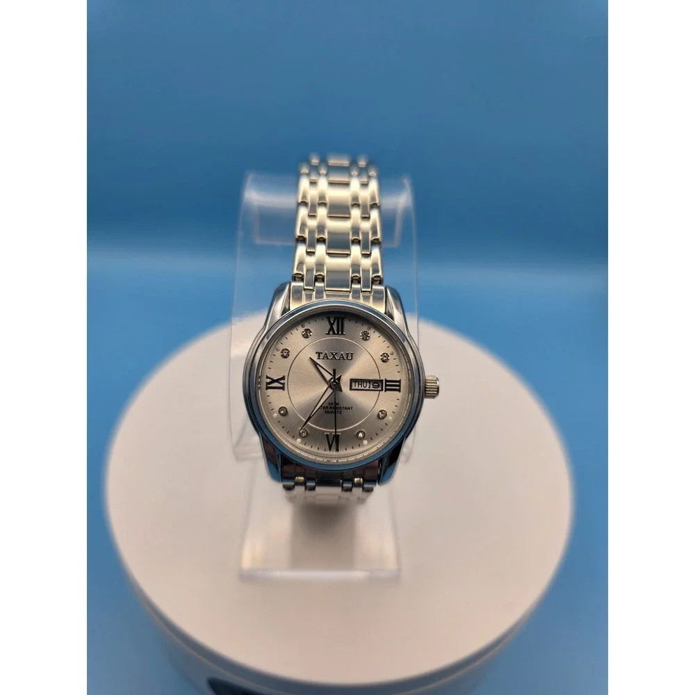 Taxau Quartz Woman's Watch Silvertone‎ Water Resistant 3 ATM Day/Date #0218
